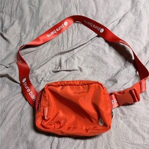 EUC Pure Barre cross body bag.